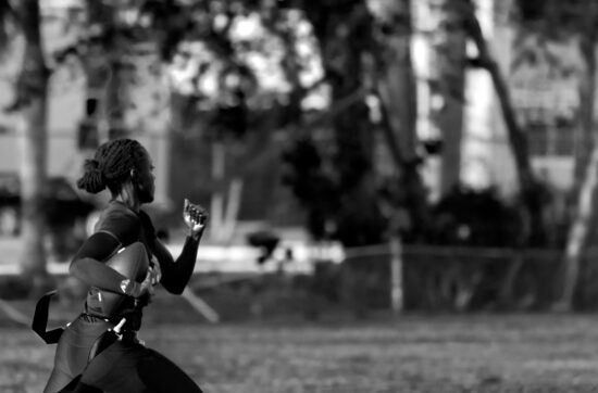 Overcome Adversity | photo of female football player | Photo by Rinald Rolle on Unsplash