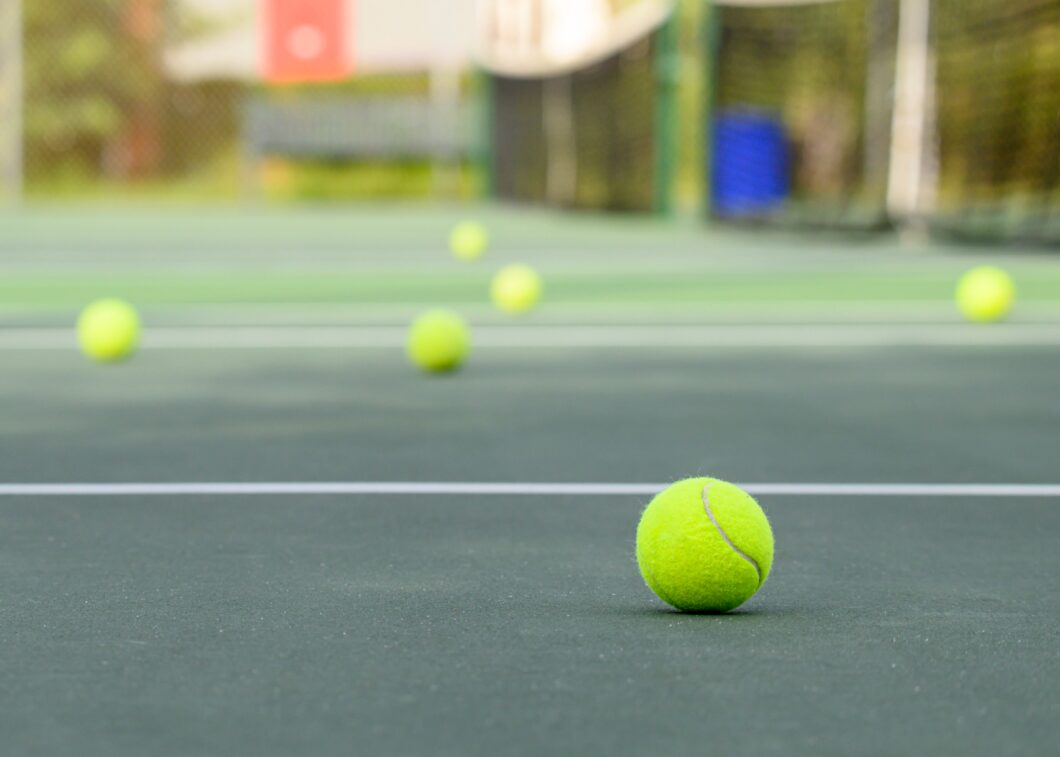 Novak Djokovic Mindfulness Reveals His Mindset Secrets, Picture of Tennis Balls on a Tennis Court