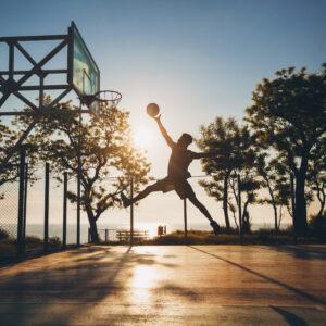 How to Find Peace in Chaos | basketball player jumping to score on court sunrise