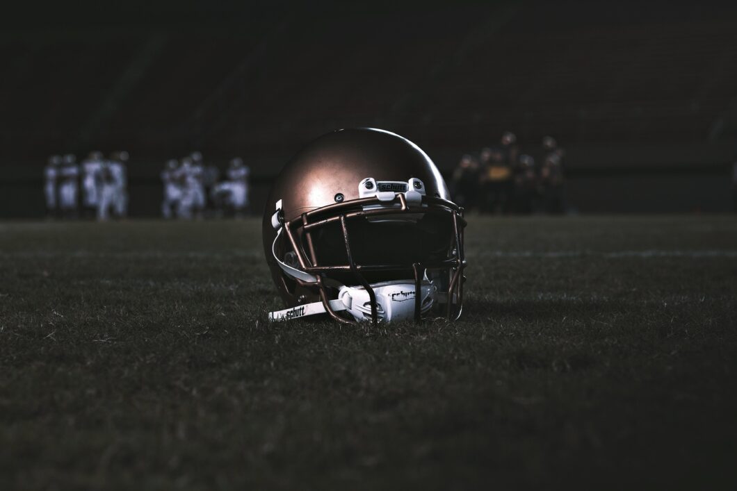 Jayden Daniels Shares Mindfulness and Winning Mindset Secrets | Photo of football helmet on field | Photo by: Photo by Lucas Andrade on Pexels