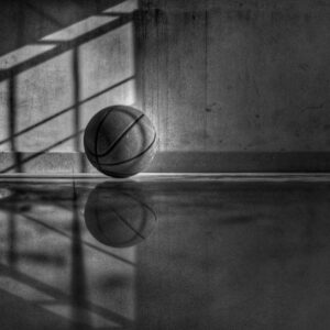 6 Reasons Why Athletes Won’t Go To Their Team For Mental Health Help | photo of empty basketball court and basketball | Photo by Abhishek Chandra on Unsplash