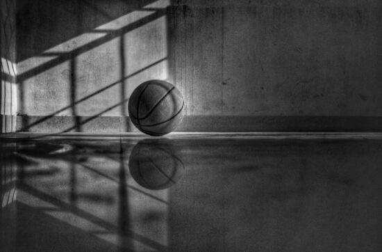 6 Reasons Why Athletes Won’t Go To Their Team For Mental Health Help | photo of empty basketball court and basketball | Photo by Abhishek Chandra on Unsplash