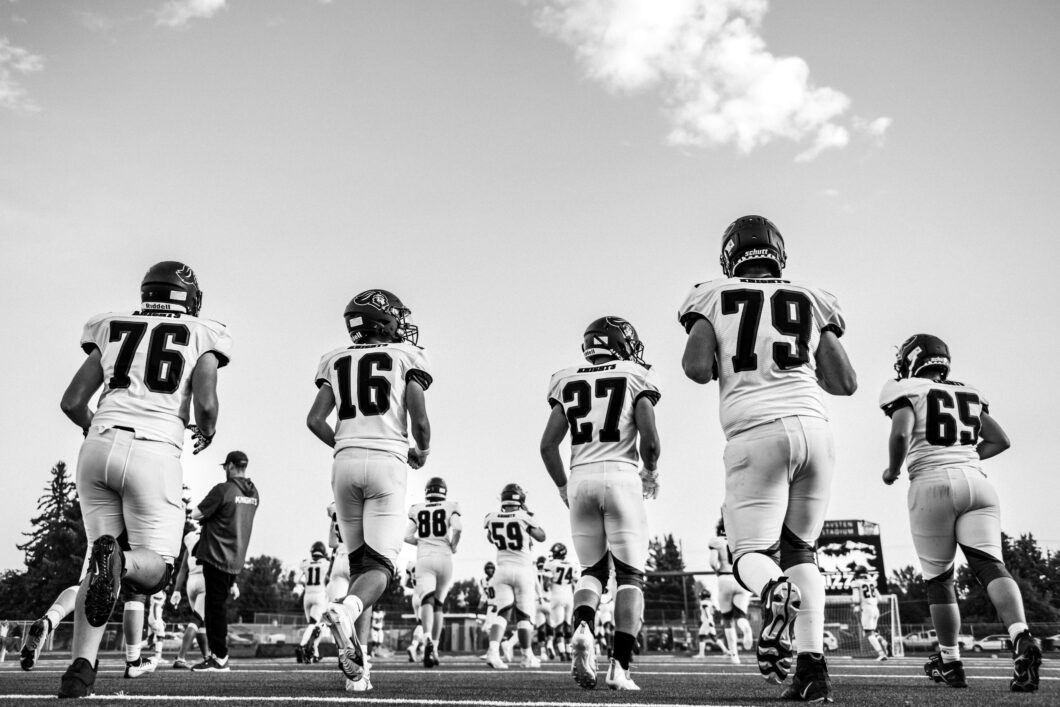 The Science Behind Mental Training for Athletes - image showing group of football players