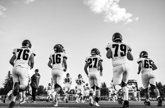 The Science Behind Mental Training for Athletes - image showing group of football players